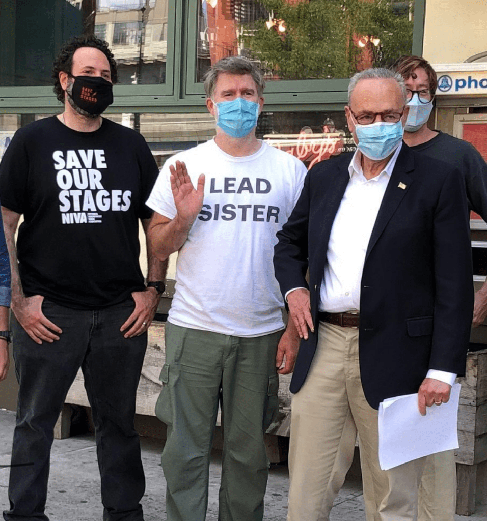 Senator Chuck Schumer, LCD Soundsystem frontman James Murphy, and NIVA Executive Director Rev. Moose